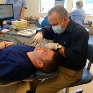 Dr. Croft examining patient. Orthodontist in Salmon Creek, WA
