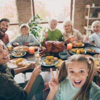 Family during thanksgiving smiling